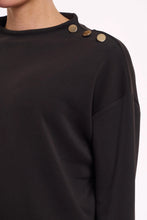 Load image into Gallery viewer, Model wearing Rino &amp; Pelle - Hanne Mock Neck Scuba Top in Black.
