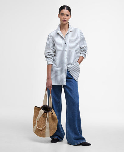 Model holding Barbour Lily Beach Tote Bag in Natural.