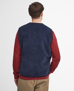 Model wearing Barbour Liddesdale Fleece Vest in Navy - back.