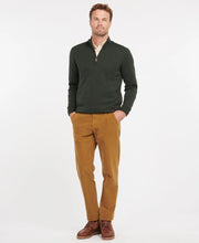 Load image into Gallery viewer, Model wearing Barbour Gamlin Half Zip Sweater Olive.
