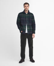 Load image into Gallery viewer, Model wearing Barbour Chapter Tailored Check Overshirt in Green Loch Tartan.
