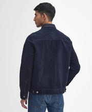 Load image into Gallery viewer, Model wearing Barbour Garment Dyed Cord Overshirt in Navy - back.
