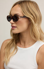 Load image into Gallery viewer, Model wearing ZSupply Dayglow Sunglasses in dark tortoise - gray polarized.
