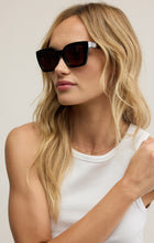 Load image into Gallery viewer, Model wearing ZSupply Hideaway Sunglasses in Black Tortoise - Brown Polarized.
