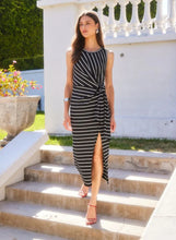 Load image into Gallery viewer, Model wearing Fifteen Twenty - Maddie Side Knot Midi Dress in Stripe Blk/white.
