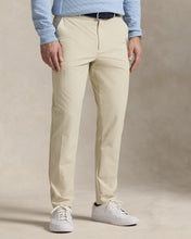 Load image into Gallery viewer, Model wearing  RLX - Ralph Lauren Performance Pant in Sand.
