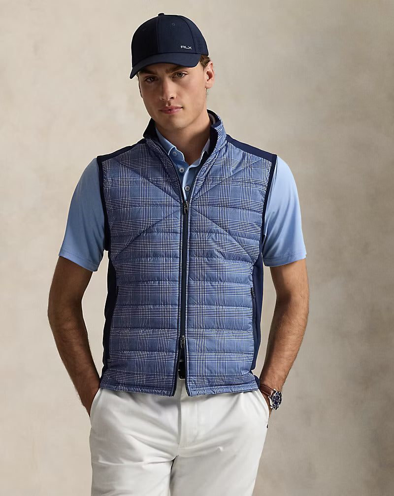 Model wearing RLX - Ralph Lauren Hybrid Full Zip Vest in Blue Multi.