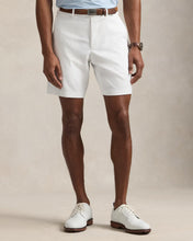 Load image into Gallery viewer, Model wearing RLX - Ralph Lauren 9-Inch Tailored Fit Performance Short in Ceramic White.
